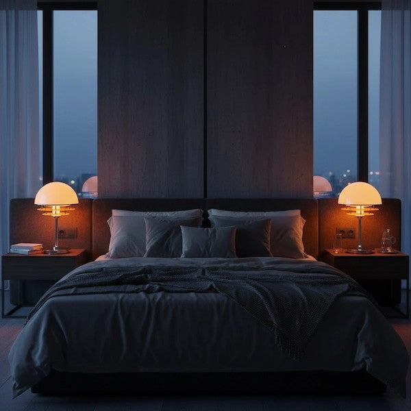 Symmetrical styling of Elwin Bauhaus sunset lamps on bedroom nightstands.