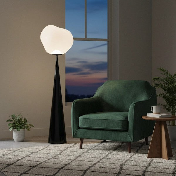 A high-end modern living room featuring the Modern Nordic Lava Floor Lamp as a glowing centerpiece of comfort.