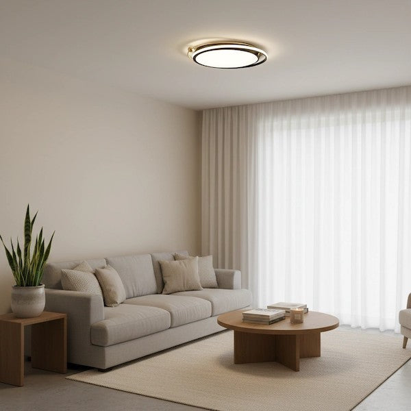 A cozy modern living room with perfect ambient lighting from a central ceiling light.