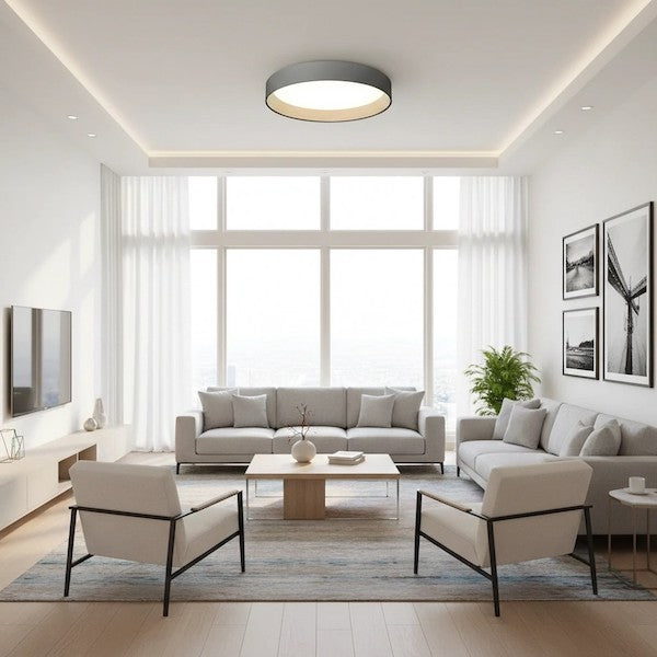 A modern living room featuring a Quinn Modern Round Flush Mount Ceiling Light for a clean aesthetic.