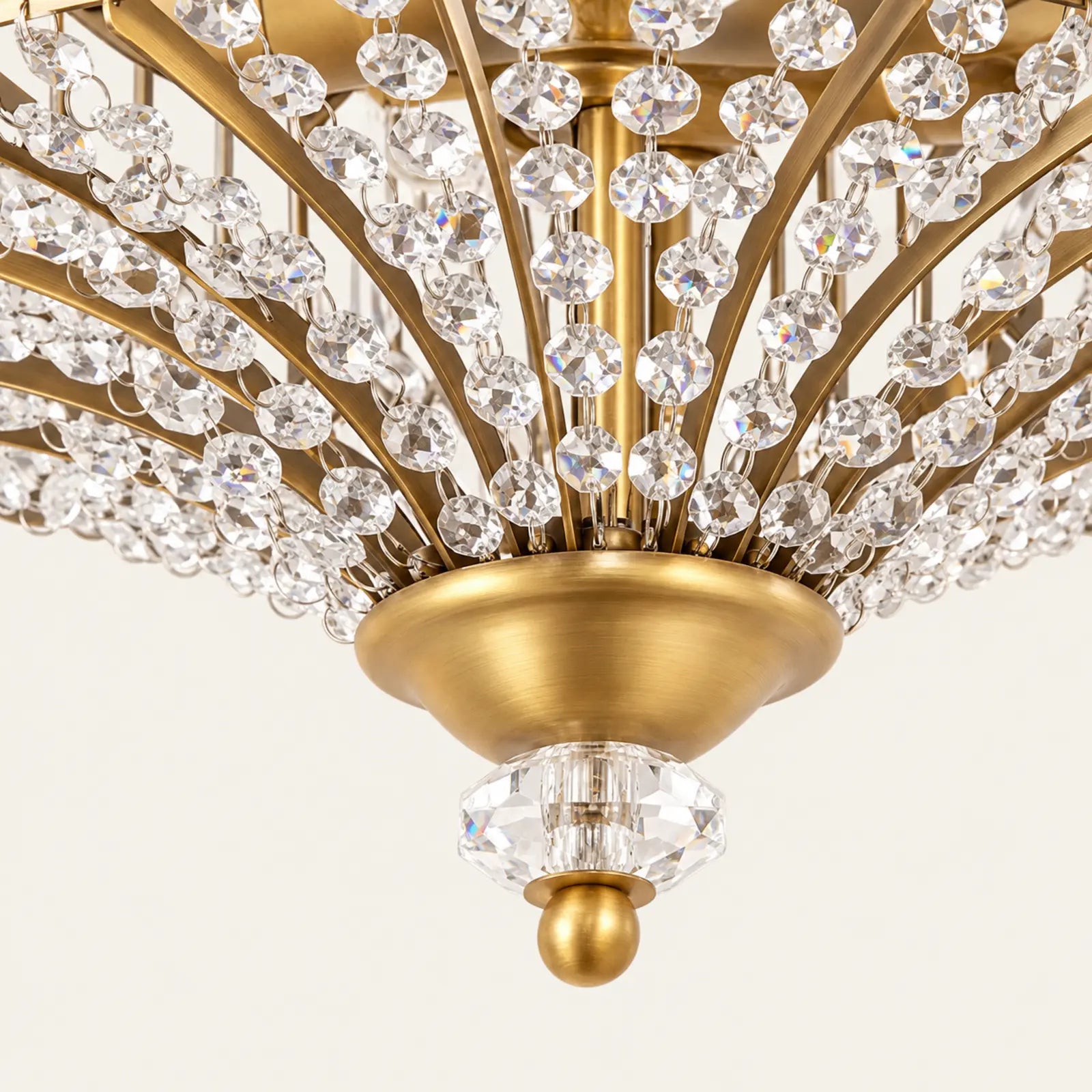Radial crystal strands and faceted finial close-up